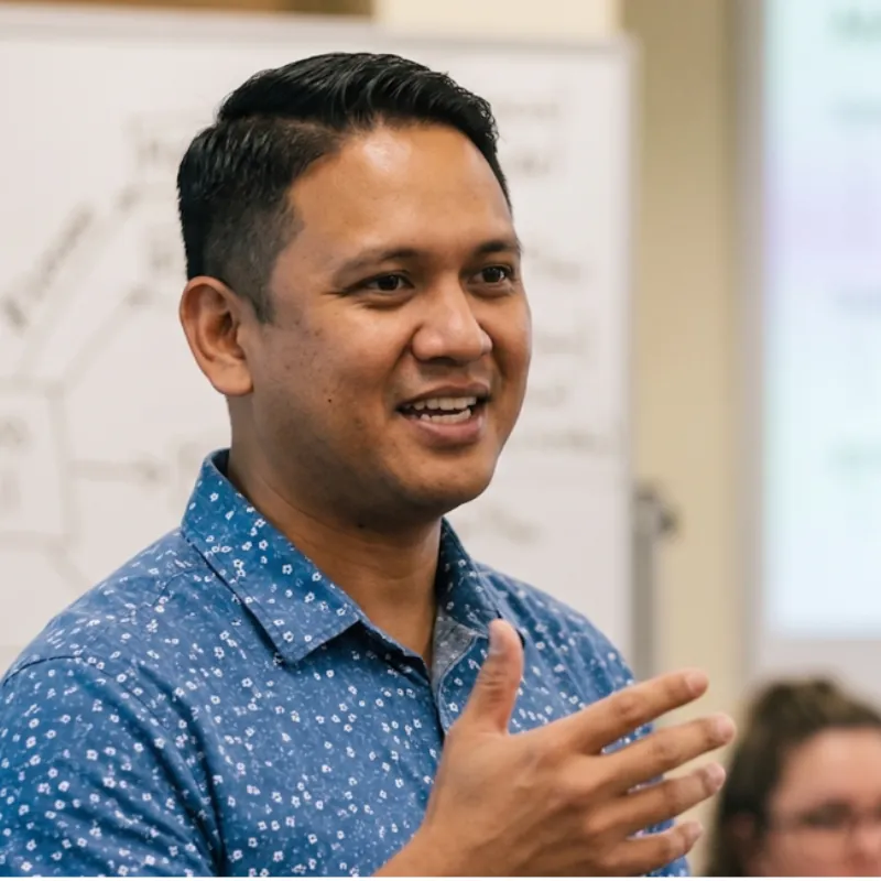 Speaker presenting at a small business workshop